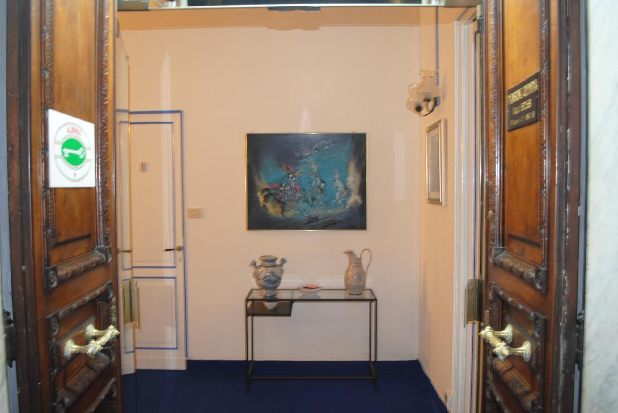 Olympia Hotel Genoa Bagian luar foto