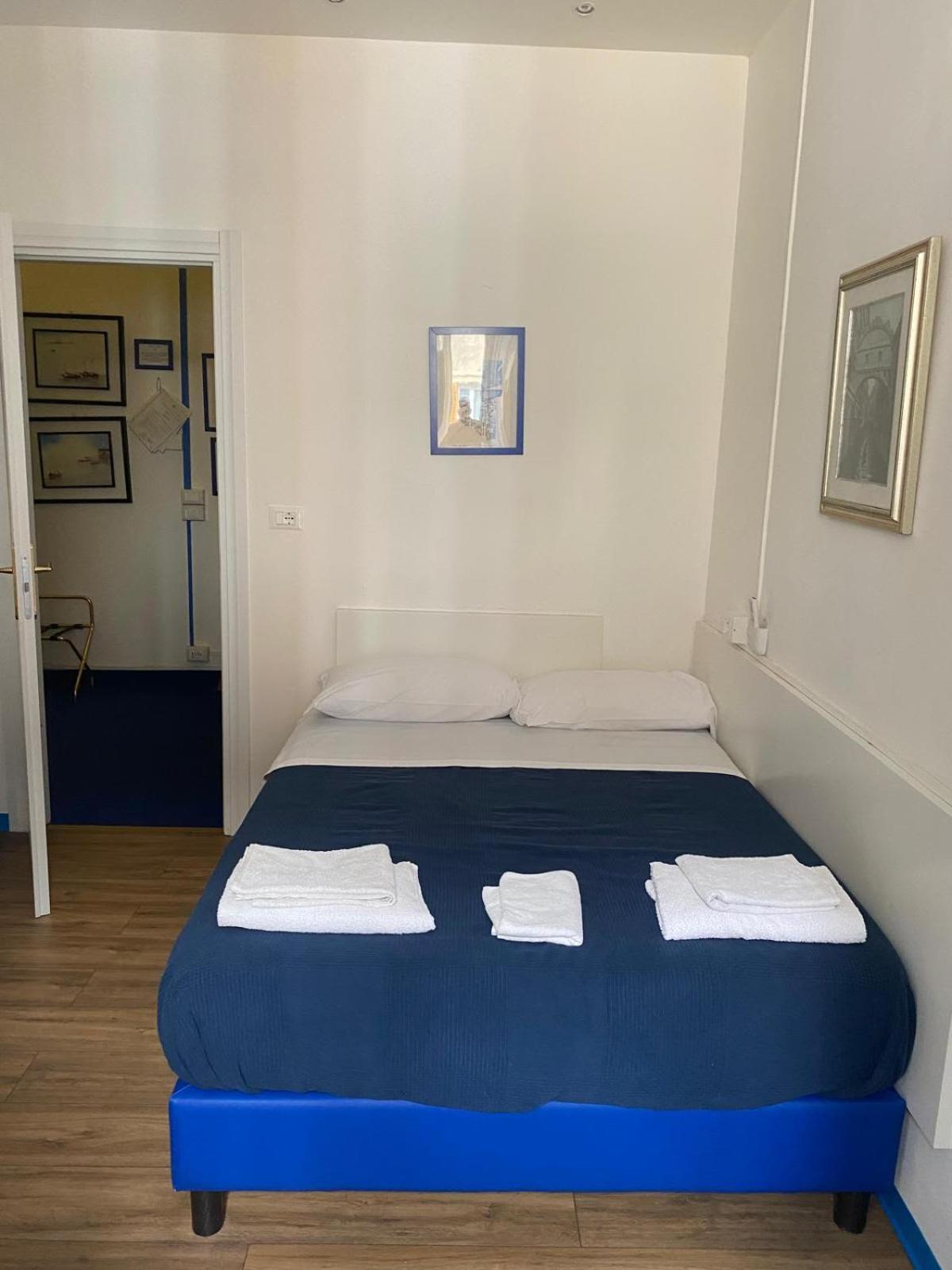 Olympia Hotel Genoa Bagian luar foto