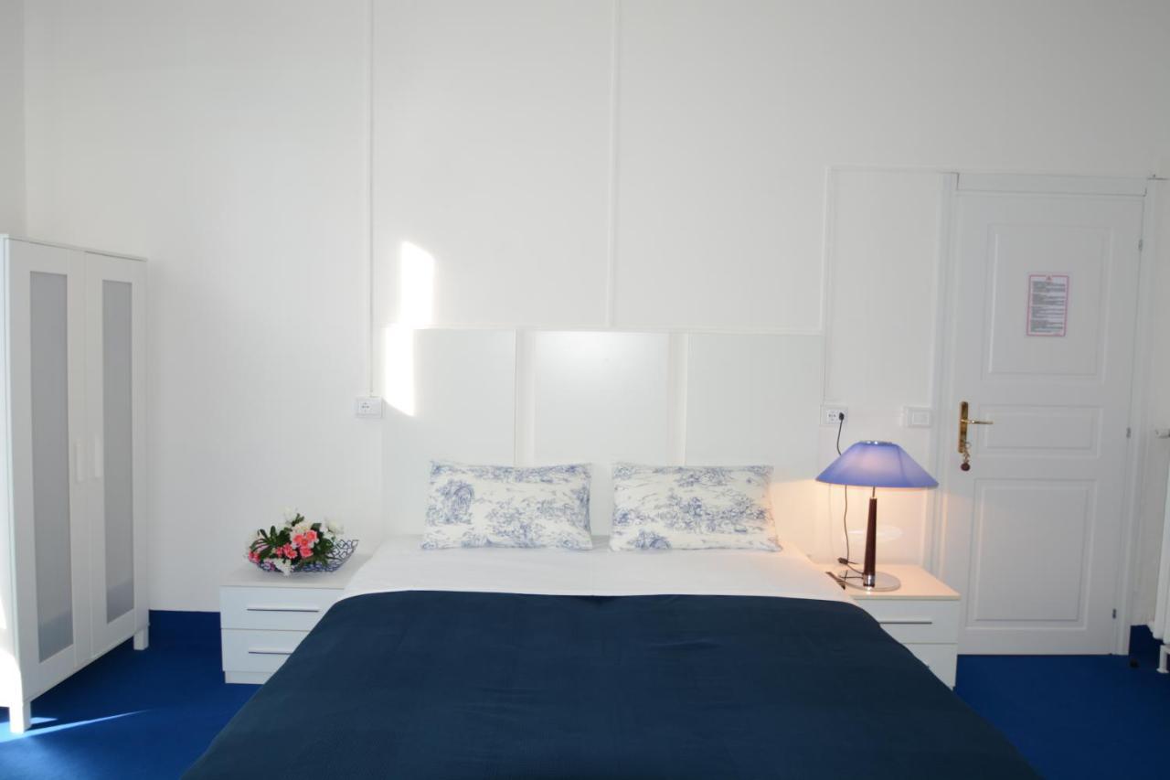 Olympia Hotel Genoa Bagian luar foto