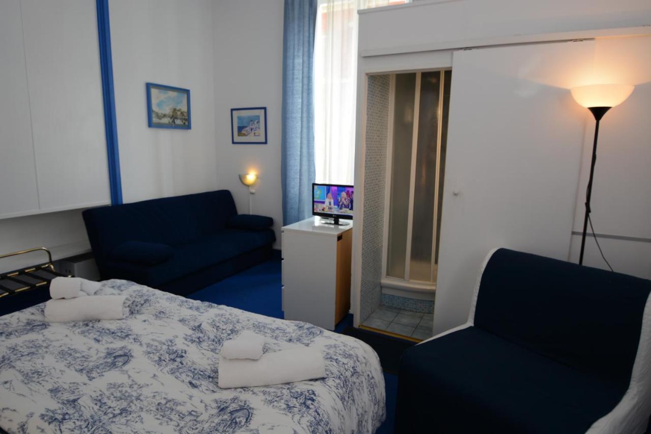 Olympia Hotel Genoa Bagian luar foto